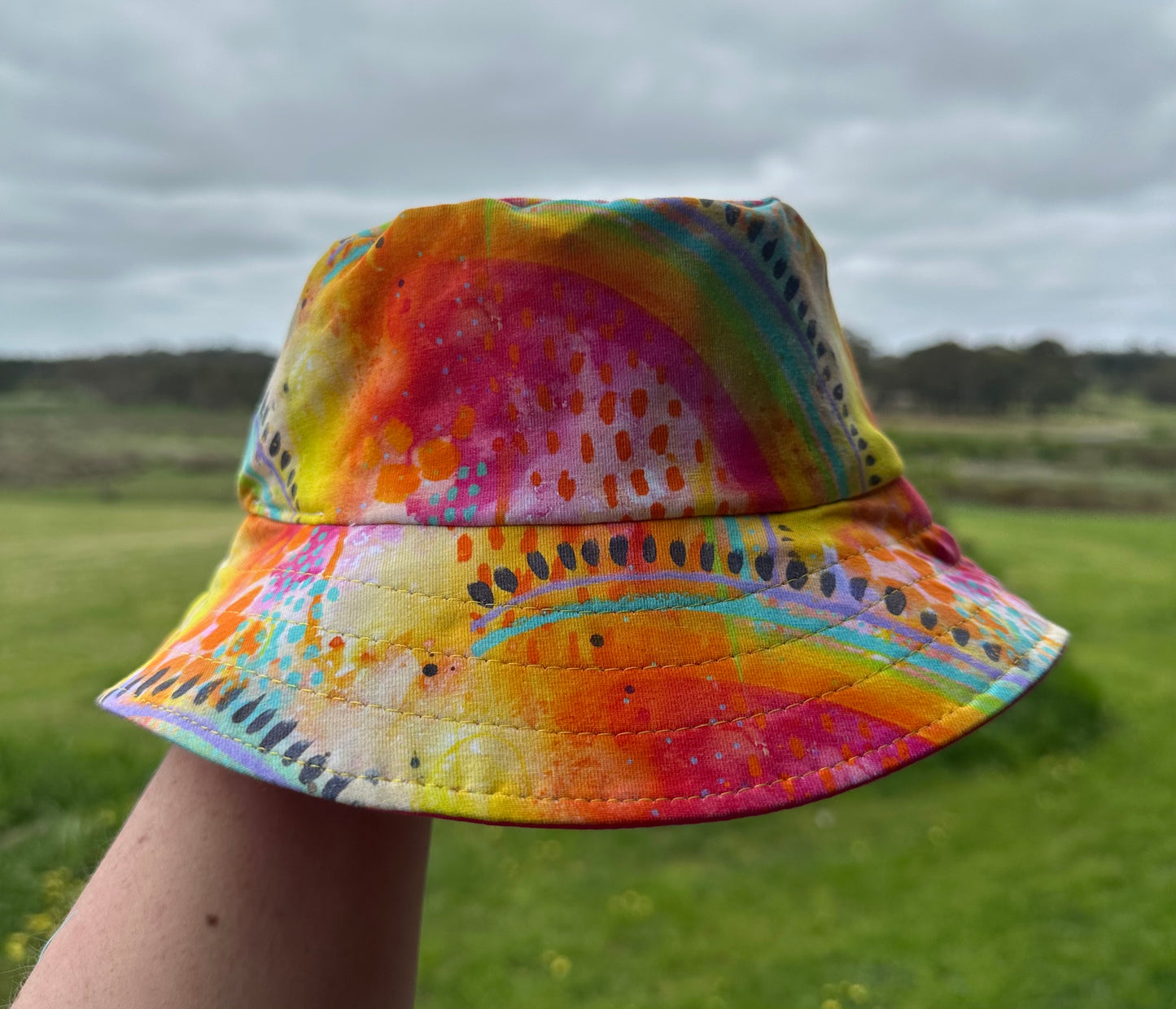 Size 6-12m Reversible Hat - Juicy